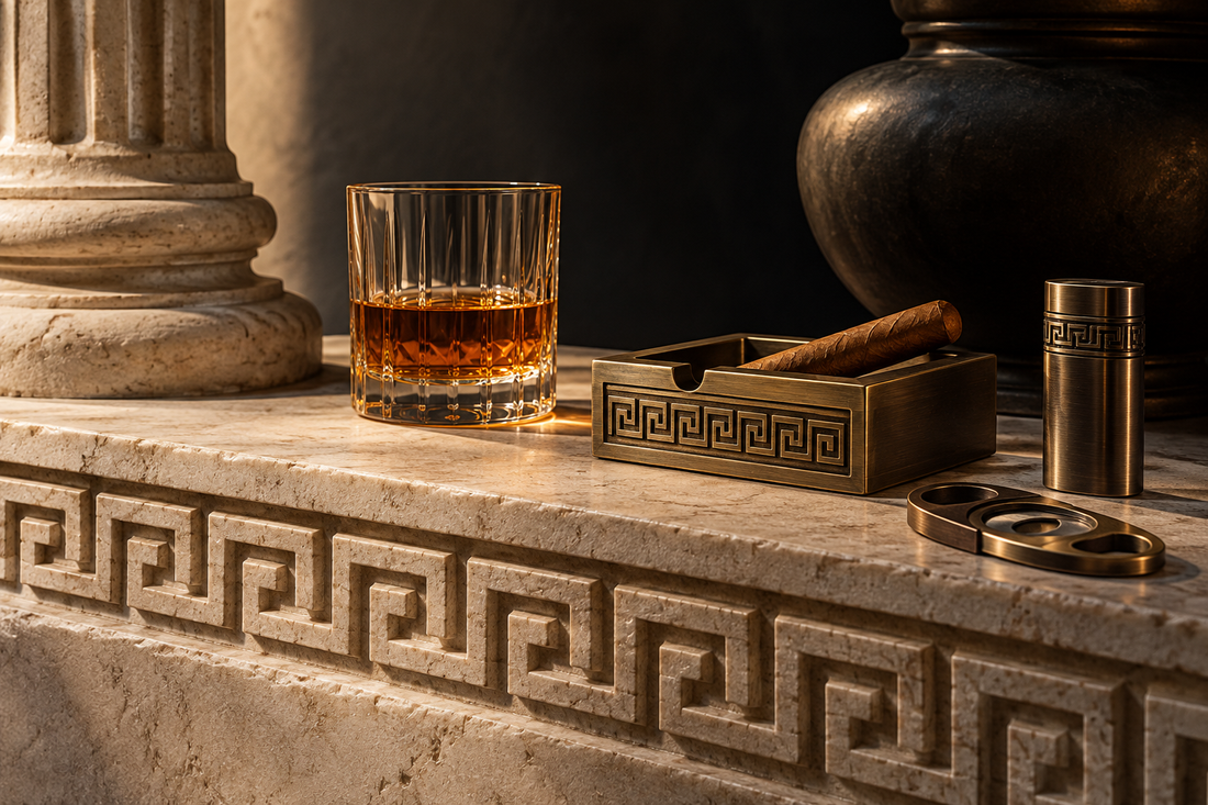 Luxury cigar ritual with bronze architectural accessories and Greek Key details